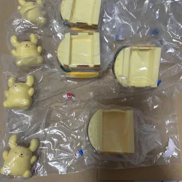 산리오퓨로랜드 한정판 트랙션 마스코트 폼폼푸딩