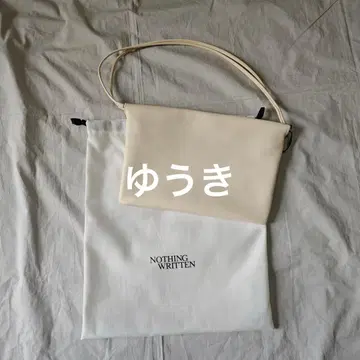 NOTHING WRITTEN 크로스 바디백 베이지