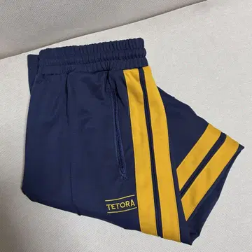 TETORA 트랙 팬츠