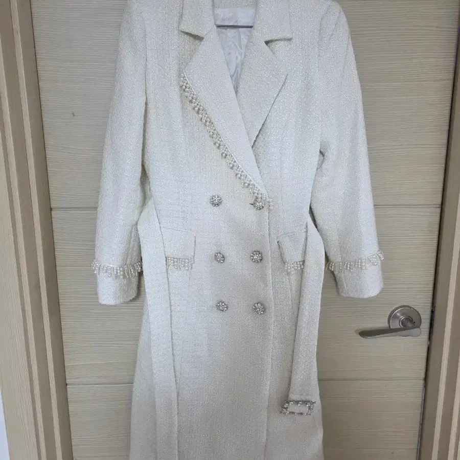 Ivory tweed pearl-embellished belt coat