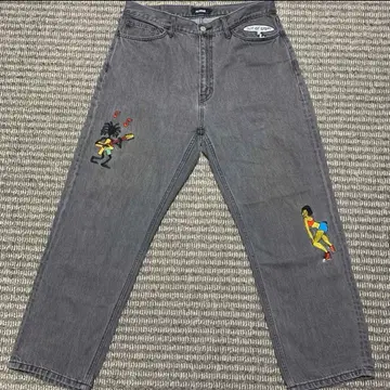 XLARGE EMBROIDERY RAVE DENIM 자수 데님 팬츠