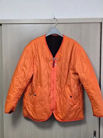 프릭스 스토어 오렌지 리버서블 퀼팅 자켓