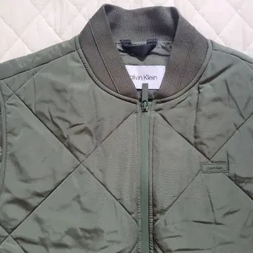 새상품 캘빈클라인 충전솜 다운 베스트