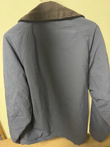 그레이 나일론 자켓 카라 부착