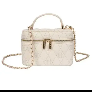 Her lip to Monogram Quilted Vanity Bag