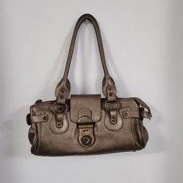 브론즈 가죽 핸드백 플랩 포함