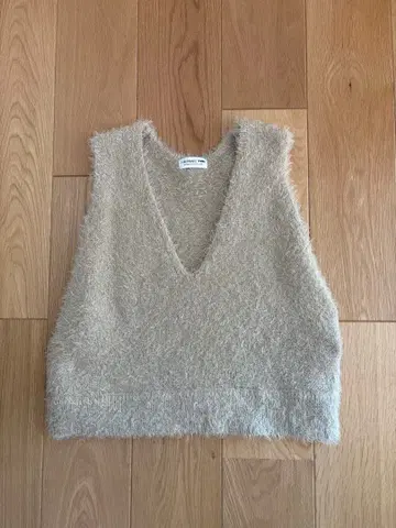 차오패닉 티피 믹스 페더 얀 크롭 베스트