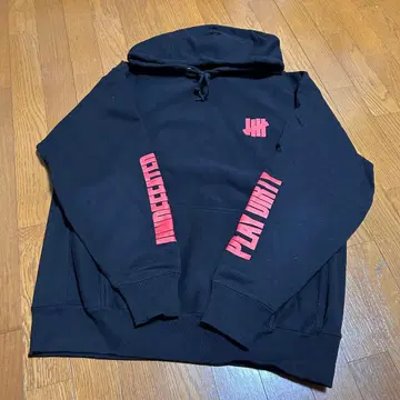 UNDEFEATED 소매 프린트 후드티