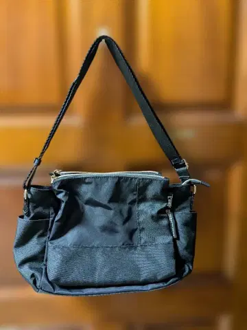 가벼운 핸들이 달린 5층 요철 레이어드 숄더백