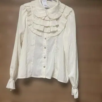 아이보리 프릴 블라우스 M 사이즈