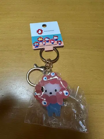 오사카 간사이 만박 산리오 미야쿠미야쿠 클리어 키링 포차코