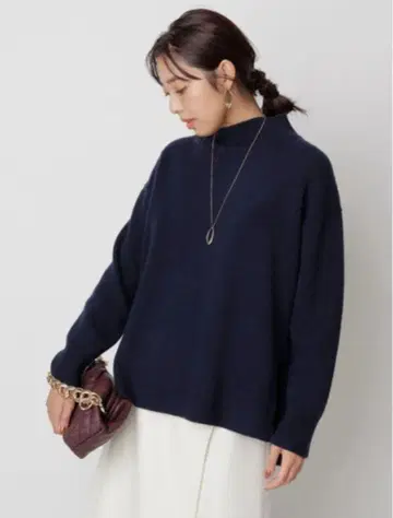 JUSGLITTY 울 캐시미어 하이넥 니트