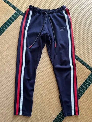 LYFT 슬림핏 스트라이프 조거 팬츠 네이비