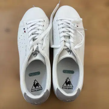 르꼬끄 스포르티브 화이트 스니커즈