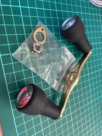 캘커타 콩퀘스트 md 핸들 베이트 릴 핸들 골드/블랙