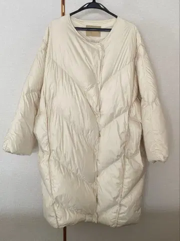 아이보리 퀼팅 코트 후드 부착