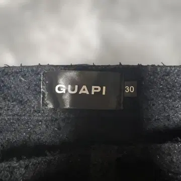 guapi 슈퍼 턱 플레어 팬츠 블랙