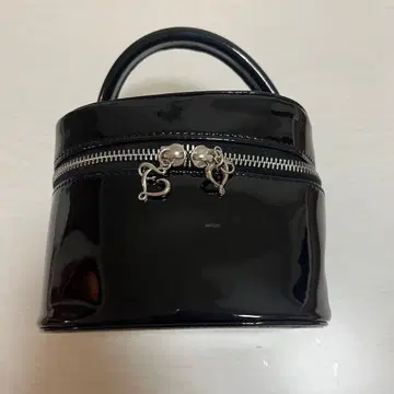 the virgins enamel heart vanity bag