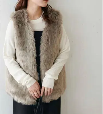 DISCOAT 롱 퍼 베스트