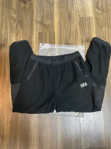 SEA 블랙 조거 팬츠 / WIND AND SEA / 보아 플리스 팬츠