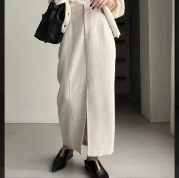 카프리슈 마쥬 앞 슬릿 슬랙스 스커트