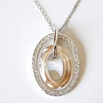 스와로브스키 로건 골든 섀도우 펜던트