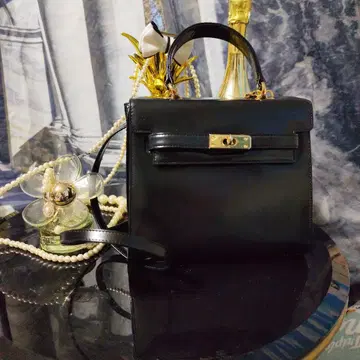 미라숀 블랙 가죽 핸드백 골드 금장 장식