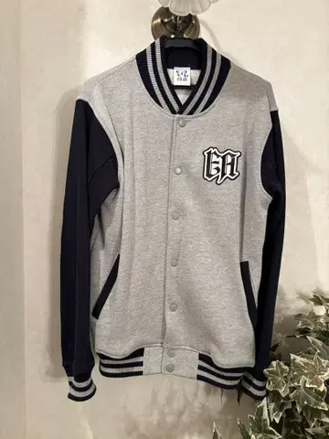 EIR AOI 바시티 자켓