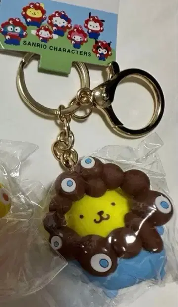 산리오 미야쿠미야쿠 변신 입체 키링 폼폼푸딩