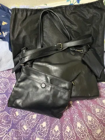 새상품급 COMPLETE WORKS 블랙 가죽 토트백