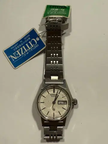 시티즌 쿼츠 코스모스 라운드 화이트 다이얼 손목시계