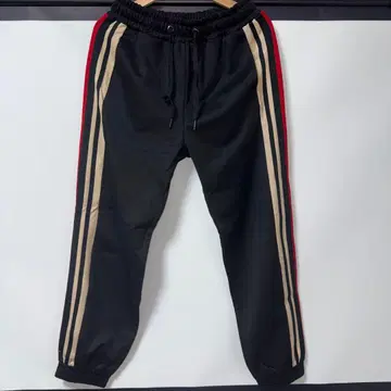 ADRER LINE TRACK PANTS