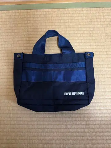 BRIEFING 네이비 라운드 백