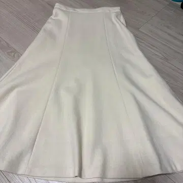 아이보리 플레어 스커트 사이드 지퍼