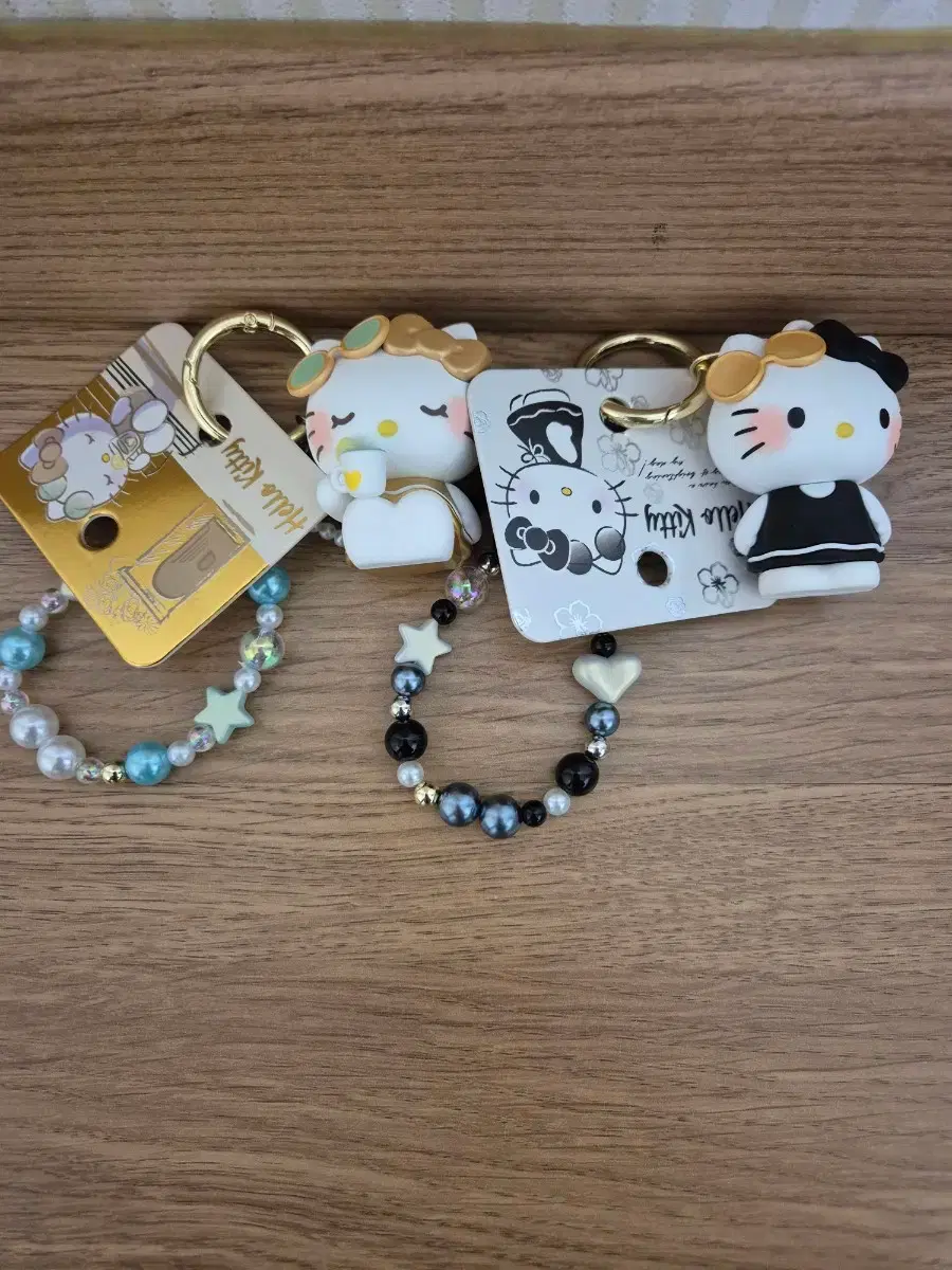 New) Black/Whitey Bead Strap Hello Kitty Keychain