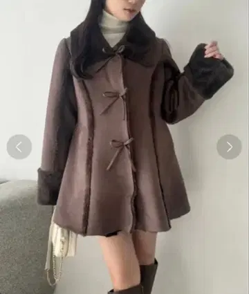 페플럼 리본 페이크 무스탕 코트