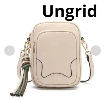 [ Ungrid ] 트위스트 태슬 세로형 숄더백