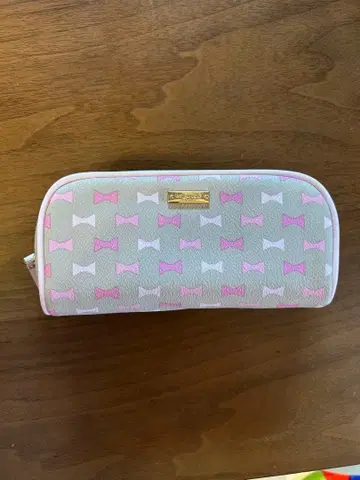 케이트 스페이드 리본 무늬 파우치