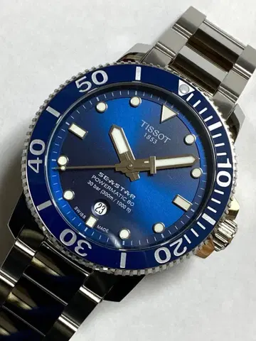 TISSOT 티쏘 씨스타 1000 자동 와인딩 파랑 다이얼 300m 방수