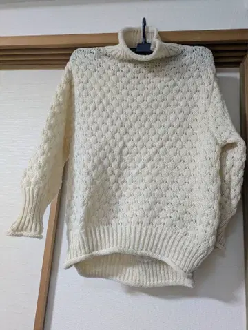 아이보리 뜨개질 터틀넥 스웨터