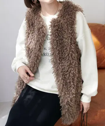 DISCOAT 컬리 퍼 베스트 모카