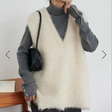 DISCOAT 페더얀 튜닉 베스트