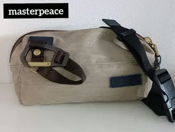 마스터피스 캔버스 바디백 베이지