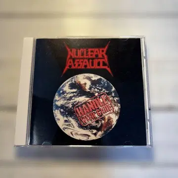 Nuclear Assault / Handle with Care