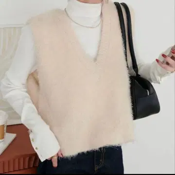 DISCOAT 전후 2WAY 페더얀 숏 베스트 아이보리