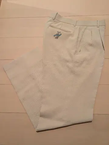 M.U SPORTS 우에사코 아이보리 슬랙스 팬츠 자수 로고 포함