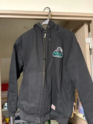 XLARGE 블랙 점퍼 후드 부착