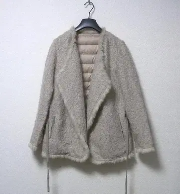 DAMA collection  다운 절개 퍼 니트 자켓