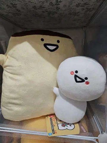 푸딩에게 안기는 문구 봉제 인형