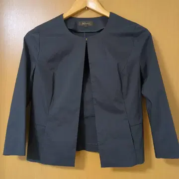 Reflect 네이비 자켓과 플리츠 스커트 세트